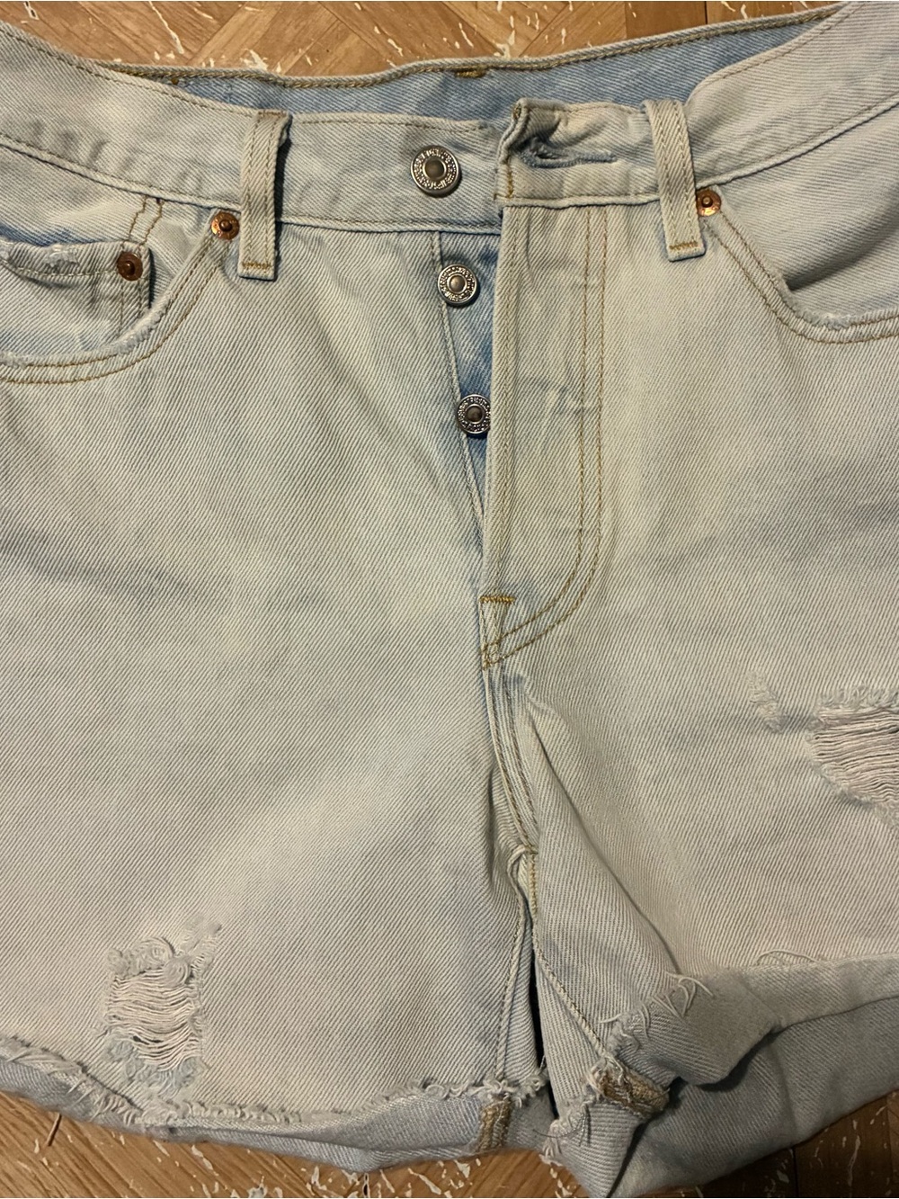 Levi's Faded Light Blue Distressed Jean Cutoff Shorts